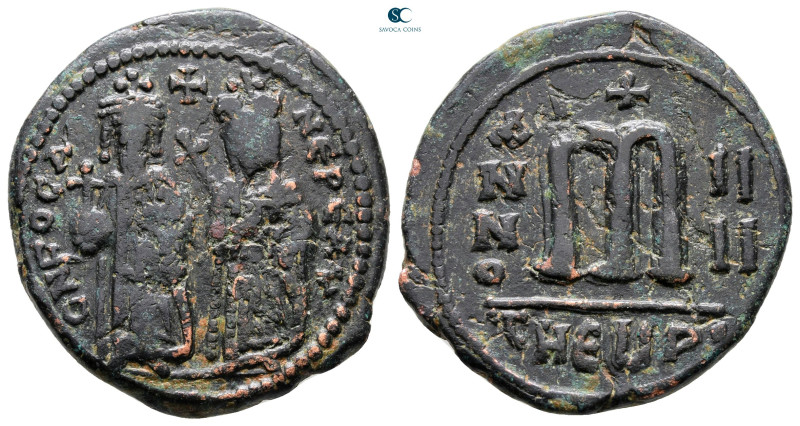 Phocas, with Leontia AD 602-610. Theoupolis (Antioch)
Follis or 40 Nummi Æ

2...