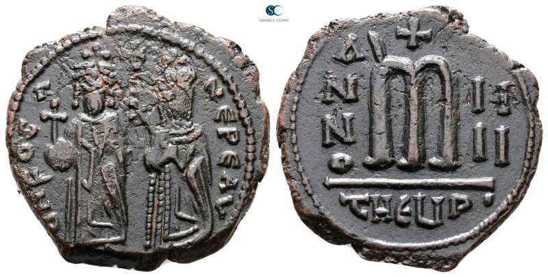 Phocas, with Leontia AD 602-610. Theoupolis (Antioch)
Follis or 40 Nummi Æ

2...