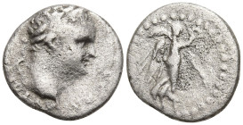 CAPPADOCIA. Caesarea-Eusebia. Titus (79-81 AD).
AR Hemidrachm (12.9mm 1.52g)
Obv: Laureate head right
Rev: Nike advancing right, holding wreath and...