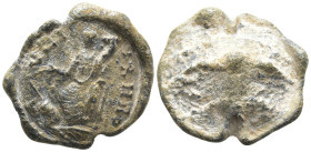 Lead Seal
(3.55g 15.6mm diameter)
Obv: Female seated left, holding rudder and cornucopia; legend around