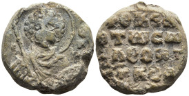 BYZANTINE LEAD SEALS.
Weight: 13.14 g. Diameter: 23.6 mm