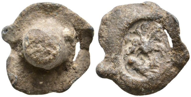 Lead Seal
Obv: Horseman galloping right, striking animal (?) with spear
(6.61g...