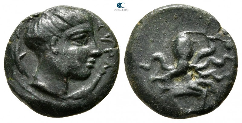 Sicily. Syracuse after 425 BC. 
Hexas Æ

15mm., 2,46g.

Head of Arethusa ri...