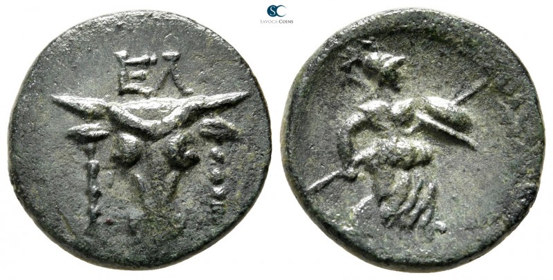 Phokis. Elateia 200-100 BC. 
Bronze Æ

18mm., 3,73g.

ΕΛ, facing head of bu...