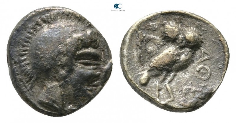 Attica. Athens circa 400-300 BC. Uncertain eastern imitation
Obol AR

8mm., 0...