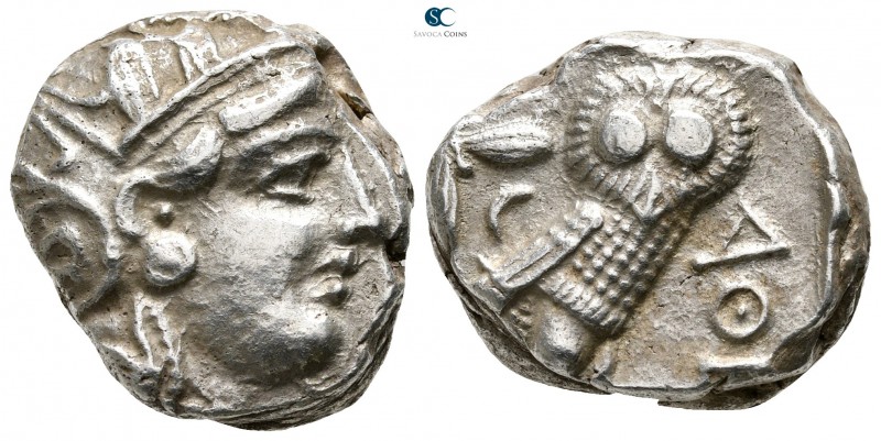 Attica. Athens 355-294 BC. 
Tetradrachm AR

22mm., 15,56g.

Head of Athena ...