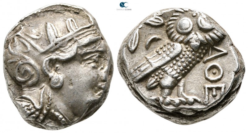Attica. Athens 355-294 BC. 
Tetradrachm AR

20mm., 17,19g.

Head of Athena ...