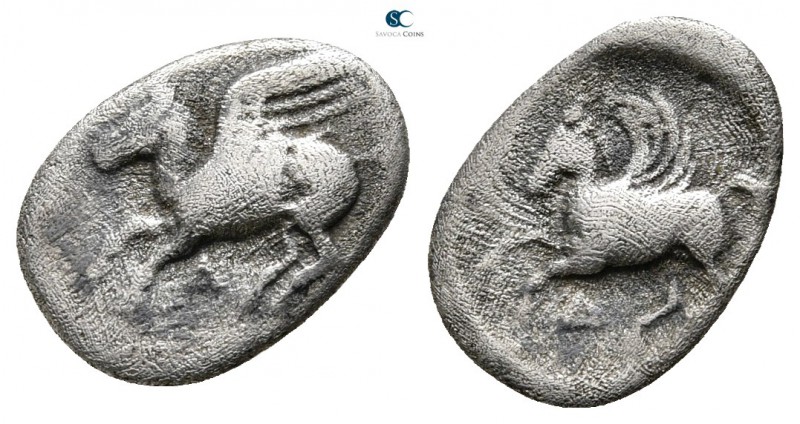 Corinthia. Corinth 375-300 BC. 
Obol AR

13mm., 0,65g.

Pegasos with curled...