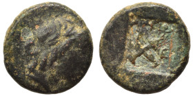 LYCIAN LEAGUE. Cragus. Late 30s-27 BC. Ae Half Unit (bronce, 1.26 g, 11 mm). Laureate head of Apollo right. Rev. ΛYKI / T-E? Bow and quiver crossed in...