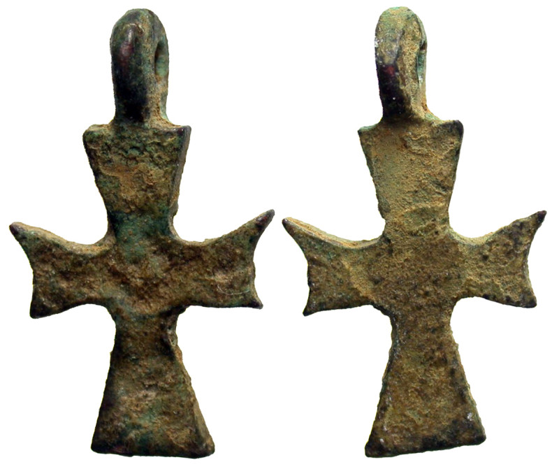 Cross pendant. 5th-7th centuries A.D. Bronze (22x14 mm, 1.98 g). Pierced for sus...