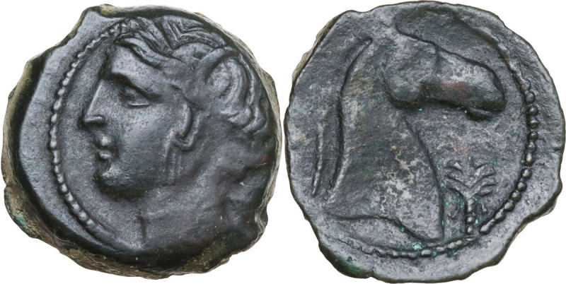 Punic Sardinia. AE 20 mm. c. 300-264 BC. Obv. Head of Tanit left, wearing wreath...