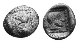 CARIA. Knidos. Circa 530-520 BC. AR Obv: Head of roaring lion right. Rev: Archaic head of Aphrodite right within incuse square. 7mm, 0,37g