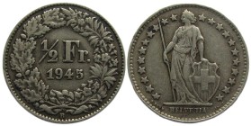 1/2 Frank AR
Switzerland 1945
Silver 835/1000
18 mm, 2,50 g
KM# 23