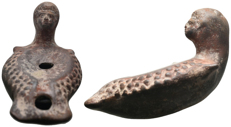 ANCIENT ROMAN SOIL OIL LAMP (1ST-5TH CENTURY AD.)

The head part has a male figu...