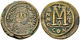 Iustinianus AE Follis, Constantinopolis 

Iustinianus I (527-565 AD). AE Follis (34 mm, 19.68 g), Constantinopolis.
 Obv. DN IVSTINIANVS PP AVG, bu...