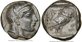 ATTICA. Athens. Ca. 465-455 BC. AR tetradrachm (24mm, 17.15 gm, 2h). NGC XF 5/5 - 2/5, edge cut. Head of Athena right, wearing crested Attic helmet or...