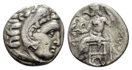 KINGS of MACEDON. Alexander III The Great. (336-323 BC). Kolophon.Drachm.

Obv : Head of Herakles right, wearing lion skin.

Rev : AΛΕΞΑΝΔΡΟΥ.
Zeus se...