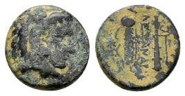 KINGS of MACEDON. Alexander III The Great. (336-323 BC).Tarsos.Ae. 

Obv : Head of Herakles right, wearing lion skin; kerykeion to right.

Rev : AΛEΞA...
