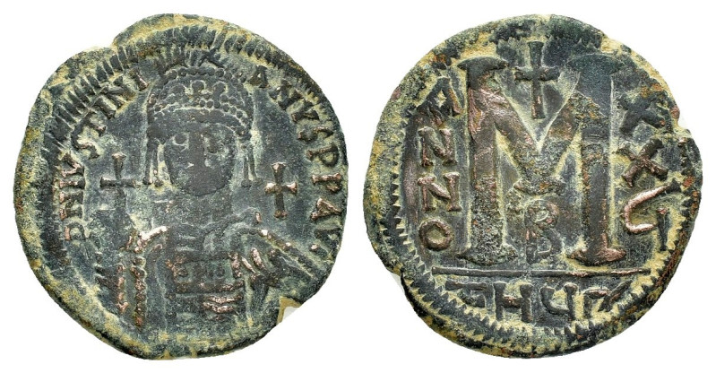 JUSTINIAN I (527-565). Follis. Antioch.

Obv : D N IVSTINIANVS P P AVG.
Helmeted...