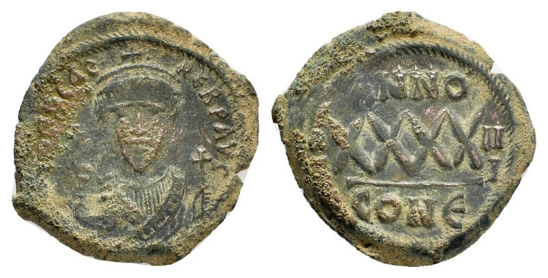 PHOCAS (602-610). Follis. Constantinople. 

Obv : D N FOCAS PERP AVG.
Crowned bu...