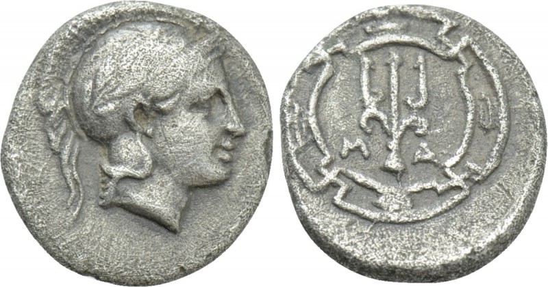 IONIA. Magnesia ad Maeandrum. Obol (Circa 400-350 BC). 

Obv: Helmeted head of...