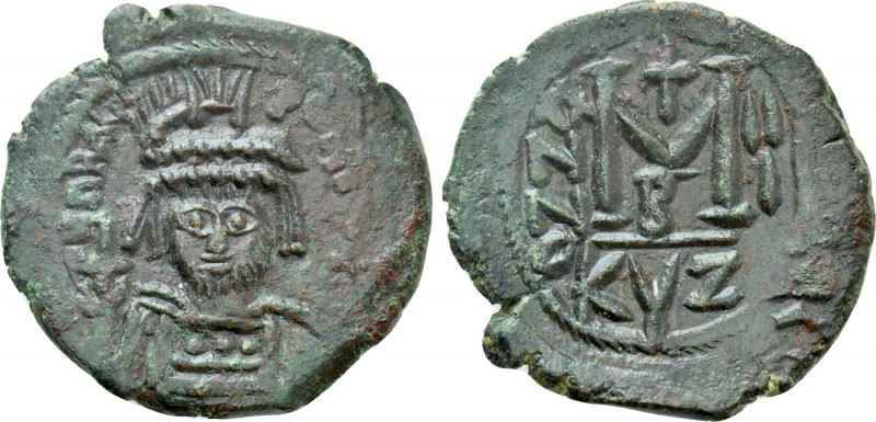 HERACLIUS (610-641). Follis. Cyzicus. Dated RY 3 (612/3). 

Obv: Helmeted, dra...