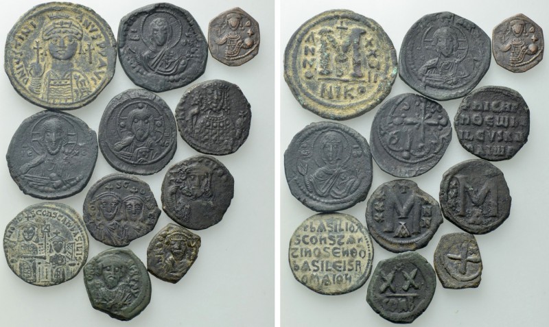 11 Byzantine Coins. 

Obv: .
Rev: .

. 

Condition: See picture.

Weigh...