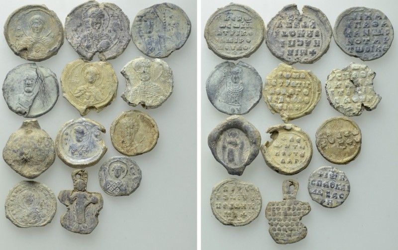 12 Byzantine Seals. 

Obv: .
Rev: .

. 

Condition: See picture.

Weigh...