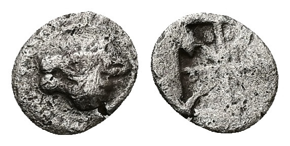 Asia Minor, Uncertain. AR Hemiobol, 0.36 g 8.39 mm. 5th century BC.
Obv: Horned ...