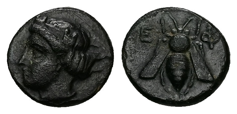 Ionia, Ephesos. Ae, 1.42 g 11.35 mm. Circa 375-325 BC.
Obv: Female head left, we...