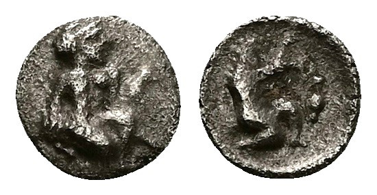 Cilicia, Uncertain. AR Hemiobol, 0.35 g 7.86 mm. 4th century BC.
Obv: Female fi...