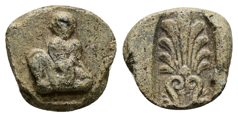 PB Greco-Roman lead token (AD 1st–3rd centuries)
Obv: Seated figure, facing.
Rev...