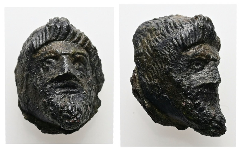 Roman, Bronze Figure (AD 1st – 2nd centuries).
The head is of a bearded man wit...