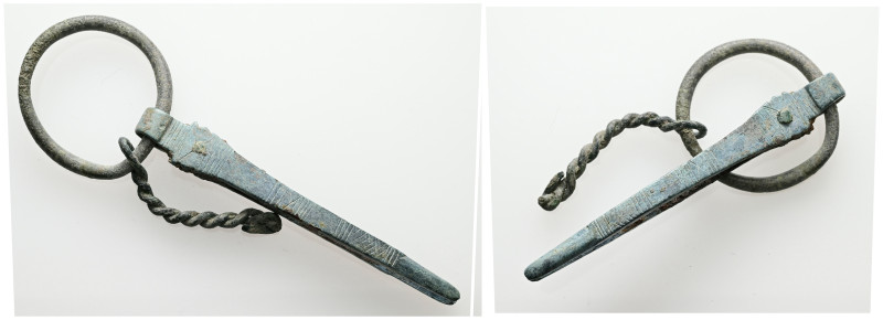 Medieval bronze tweezers with suspension loop and chain (AD 5th – 7th centuries)...