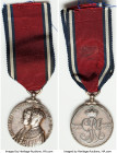 8-Piece Lot of Uncertified Assorted Issues, 1) Great Britain: George V silver Medal with Ribbon 1935 - XF. 31.9mm (Medal). 27,42gm 2) Great Britain: G...