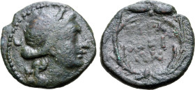 Sicily, Syracuse. Roman rule, late second century BC. Æ (2.61g, 15mm, 12h). Wreathed head of Kore to right; crescent behind R/ ΣΥPA-KOΣI-ΩN in three l...