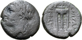 Sicily, Tauromenion, c. 305-289 BC. Æ (6.68g, 18mm, 10h). Laureate head of Apollo Archagetas to left; [APXAΓETAΣ] before. R/ Tripod; [T]AYPOM[E]NITAN ...