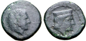 Sicily, Thermai Himeraiai, c. 367-330 BC. Æ (2.49g, 15mm, 9h). Head of Herakles to right, wearing lion skin headdress; illegible inscription R/ Head o...