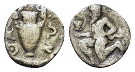 Islands off Thrace, Thasos, c. 404-340. AR Trihemiobol (11mm, 0.8g). Satyr kneeling l., holding kantharos and resting on hip. R/ Amphora; ΘAΣΙΩΝ aroun...