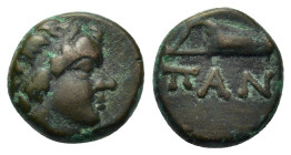 Cimmerian Bosporos, Pantikapaion, c. 310-304/3 BC. Æ (12,5mm, 2.5g). Beardless head of satyr r. R/ Bow in bowcase. MacDonald 72; HGC 4, 135.