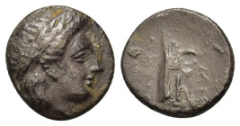 Caria, Knidos, c. 250-210 BC. Æ (13,2mm, 2g). Uncertain magistrate. Laureate head of Apollo to right R/Prow of galley to l. For type, cf. SNG Copenhag...