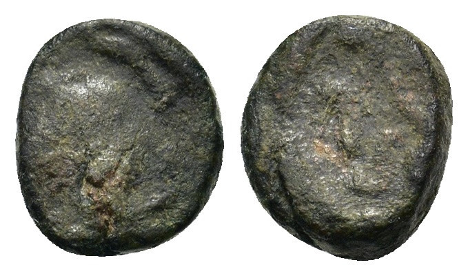 Uncertain Late Roman Æ with monogram (7mm, 0.60g).