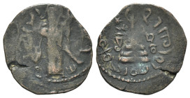 Islamic, Arab-Byzantine, Umayyad Caliphate. 'Abd al-Malik ibn Marwan (AH 65-86 / AD 685-705). Æ Fals (21mm, 2.65g, 12h). Caliph standing facing, holdi...