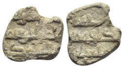 Islamic, Uncertain. PB Seal, c. 10th century (17mm, 6.30g). Three lines of kufic script. R/ Three lines of kufic script. VF.