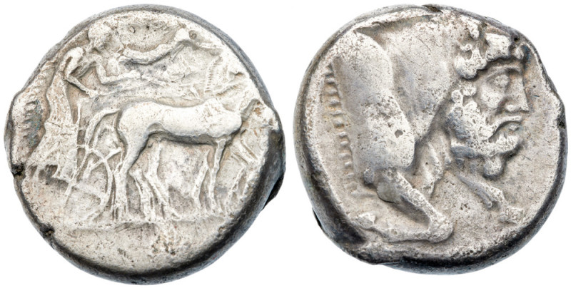 Sicily, Gela. Silver Tetradrachm (16.67 g), ca. 450-440 BC Charioteer, holding k...