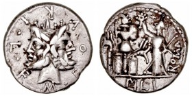 Furia. Denario. AR. (119 a.C.). A/Cabeza de Jano bifonte, alrededor M · FOVRI · L · F. R/Roma en pie coronando un trofeo con escudo y carnyx a sus pie...