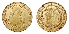 Carlos IV. 2 Escudos. AV. Sevilla CN. 1801. 6.71g. Cal.453. Marquitas. MBC-.