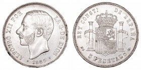 Alfonso XII. 5 Pesetas. AR. 1885 *18-87 MSM. 24.96g. Cal.42. Golpes en canto y círculo bajo la columna. MBC+.