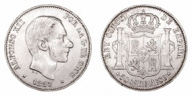 Alfonso XII. 50 Centavos de Peso. AR. Manila. 1883. 12.92g. Cal.83. Rayita en anverso. MBC/MBC+.