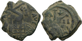 Mauricius Tiberius, 582-602. Halbfollis. Büste frontal. Rv. Großes K. Vs. Überprägt mit rundem Gegenstempel Ke. 5,78 g. 23 mm. D.O.&nbsp;136.1&nbsp;vg...